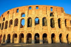 Rome, Italy - Colosseum on blue sky background
